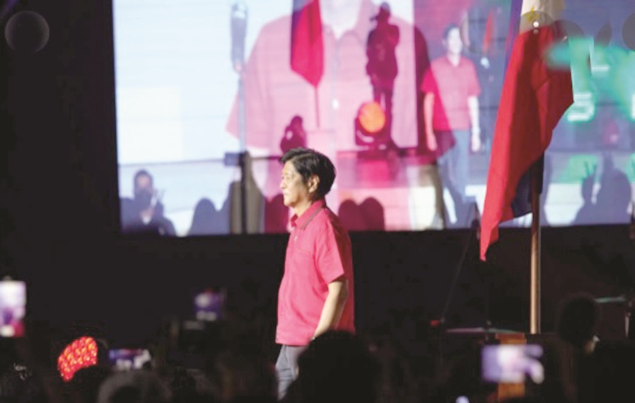 Marcos prodded to dance during the pitch of one of his  UniTeam’s senatorial bets at the St. Vincent Ferrer Prayer Park.